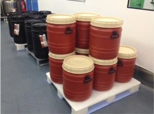 CurTec Drums in use at UNITHER: palleted 55-litre total opening drums (foreground) with 75 litre conductive drums behind