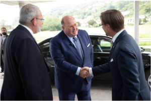 Cerbios-Pharma CEO Gabriel Haering (L) and Chairman Anton van Troostenburg welcome US Ambassador Edward McMullen Jr to Lugano